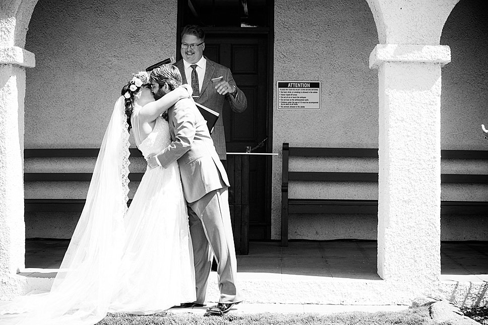 you may now kiss the bride, first kiss, rancho guajome adobe, wedding ceremony photography, tips for wedding photography, best wedding photographers, oceanside wedding photographer, recommended southern california wedding photographers